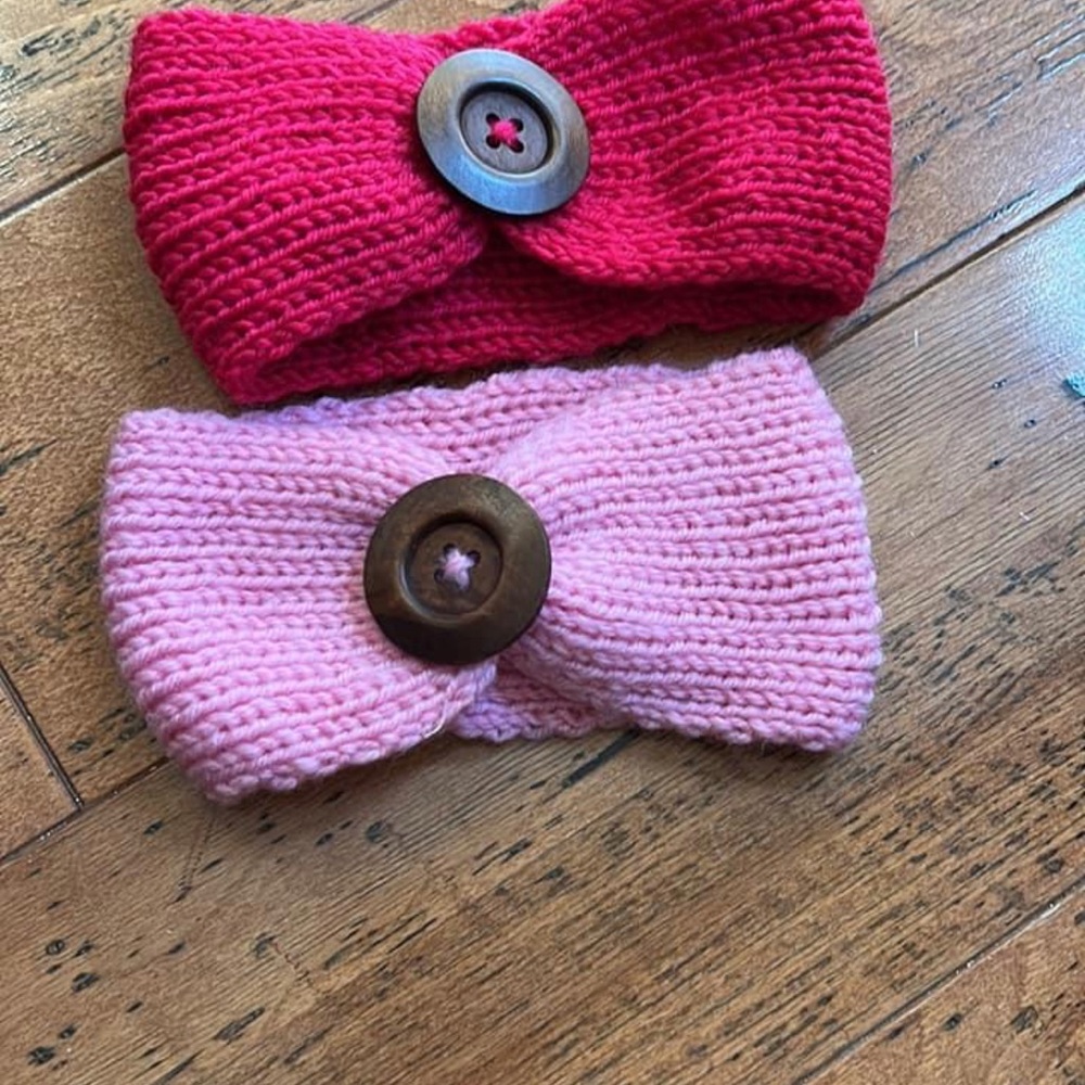 Two headbands will fit baby up to toddler in size. One light pink and hot pink.
